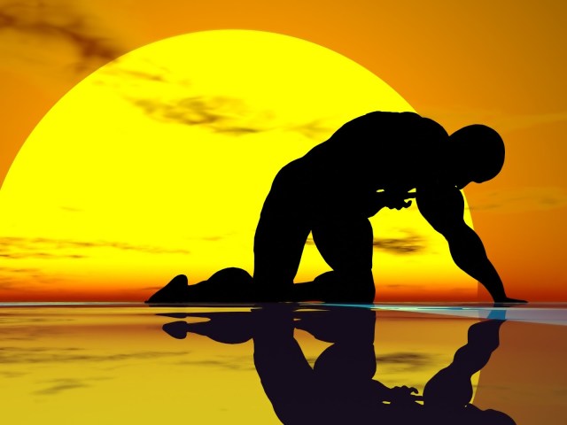 fallen-man-silhouette-and-sun